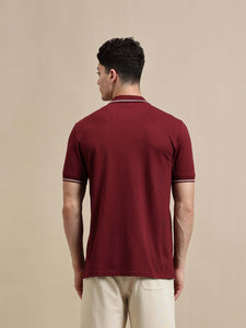 Men's Polo – Half Sleeve - Basic Polo With Tipping And Plating Slim Fit, back view of a man in a maroon polo shirt.